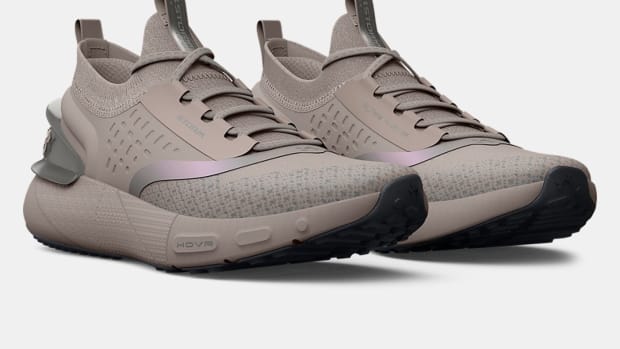 Tan Under Armour running shoes.